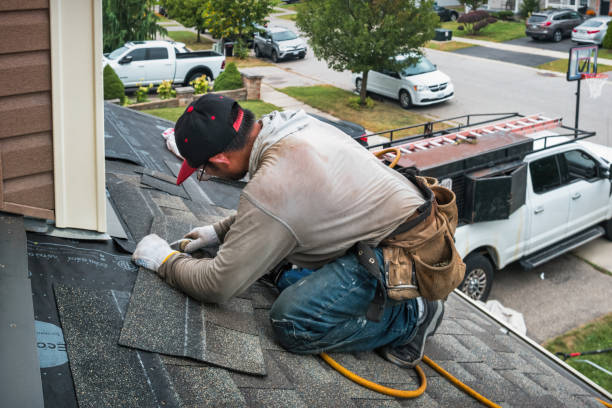Professional Roof Replacement technician working in Rindge, NH